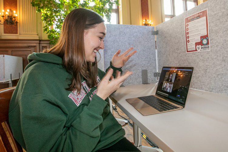 student meeting with other students over zoom